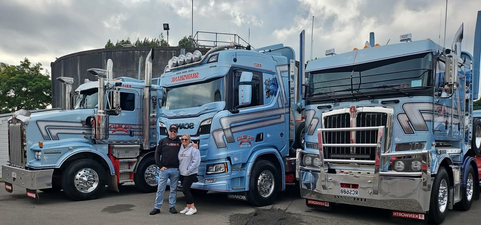 Ray and Louise Beale with their trucks